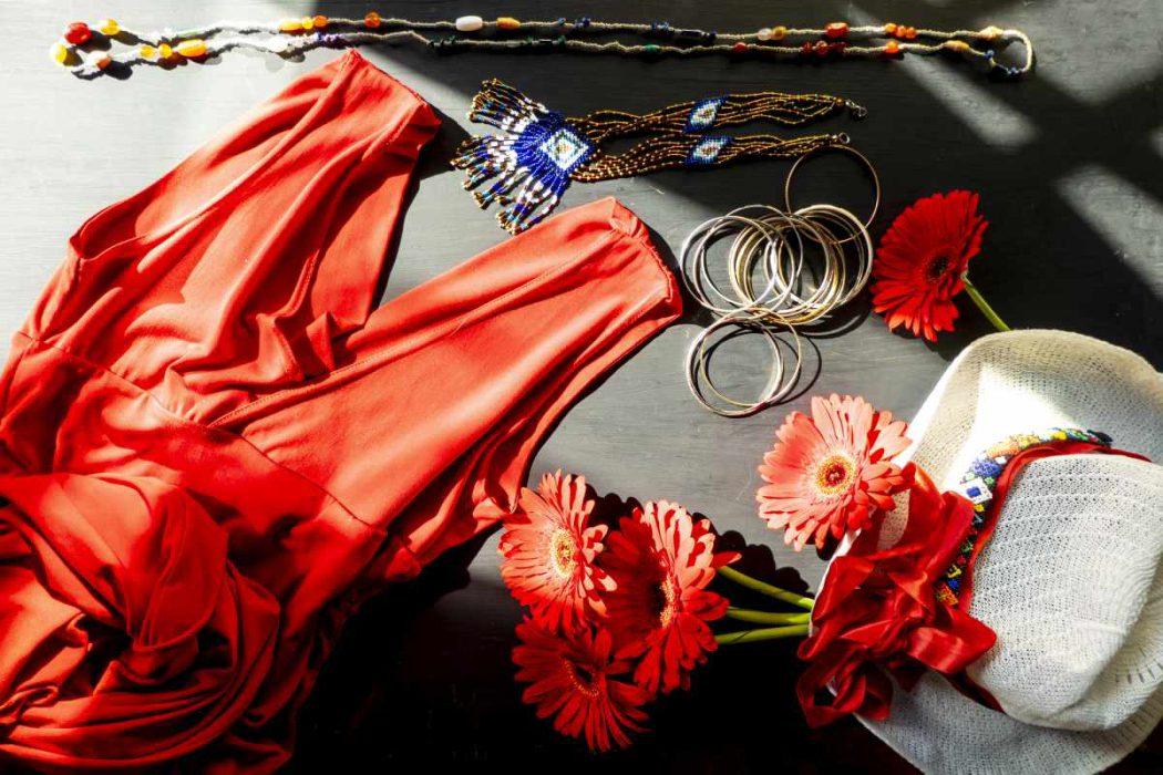 set of red, white and colorful fashion accessories on a black background