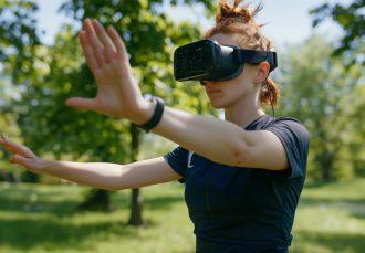 adult doing fitness through virtual reality