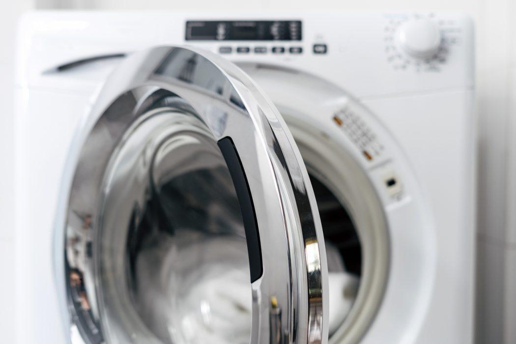 new washing machine with open door, closeup